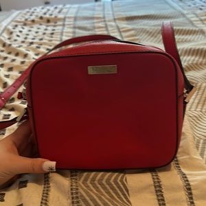 Used Kate Spade Purse; Red; used frequently, very cute with any outfit!